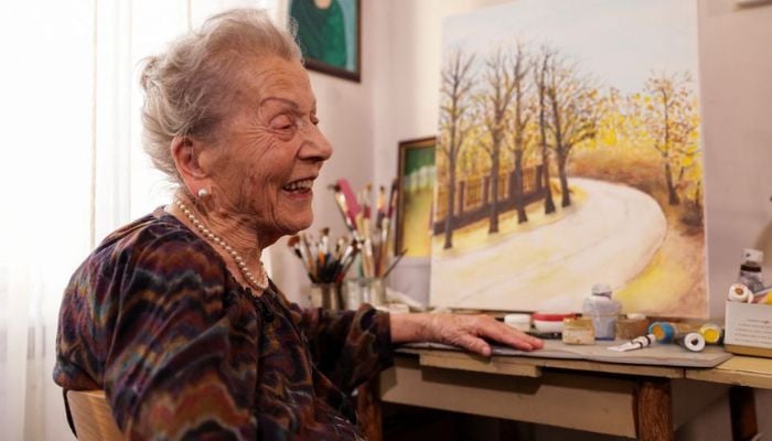 Woman marks 100th birthday by staging her own art exhibition